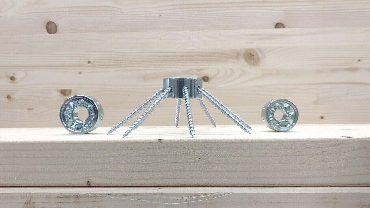 The CCS consists of a central body and eight fully threaded screws