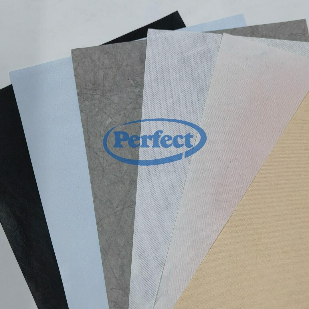 Five overlapping sheets of textured paper or fabric in black, light blue, gray, white, and beige colors, with a blue Perfect logo printed across the center.