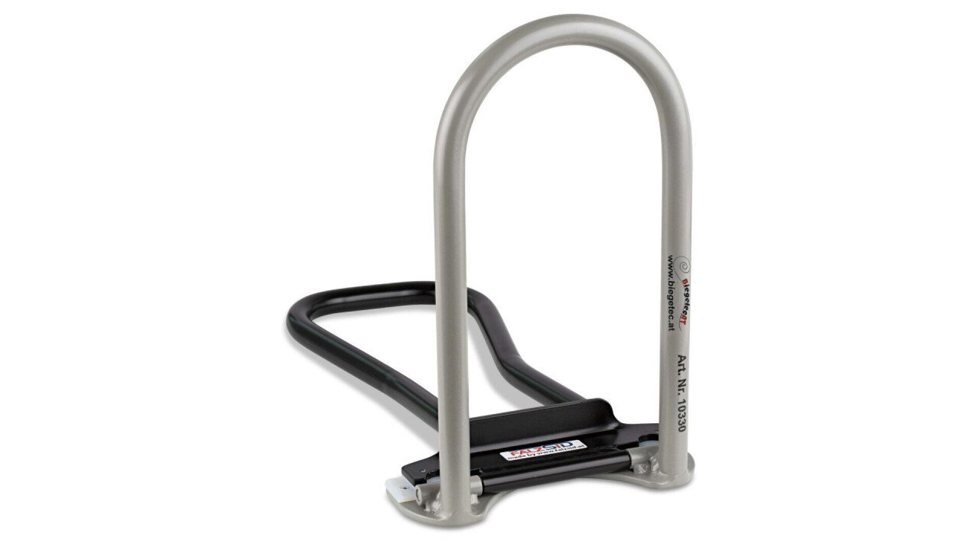 A silver and black U-lock, typically used for securing bicycles, shown standing upright on a white background. The lock body is black with labels and attached to a sturdy silver U-shaped shackle.