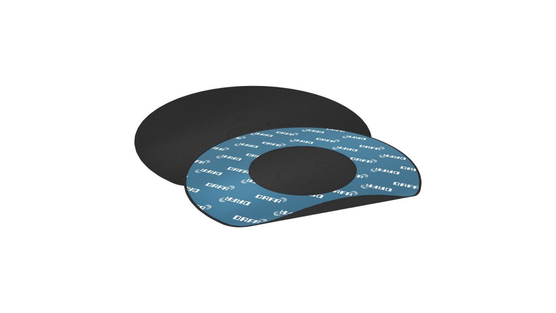 Two round adhesive pads, one black and one black with a blue and white peel-off backing. The backing has repeated GERA text printed on it. The pads are partially overlapping on a white background.