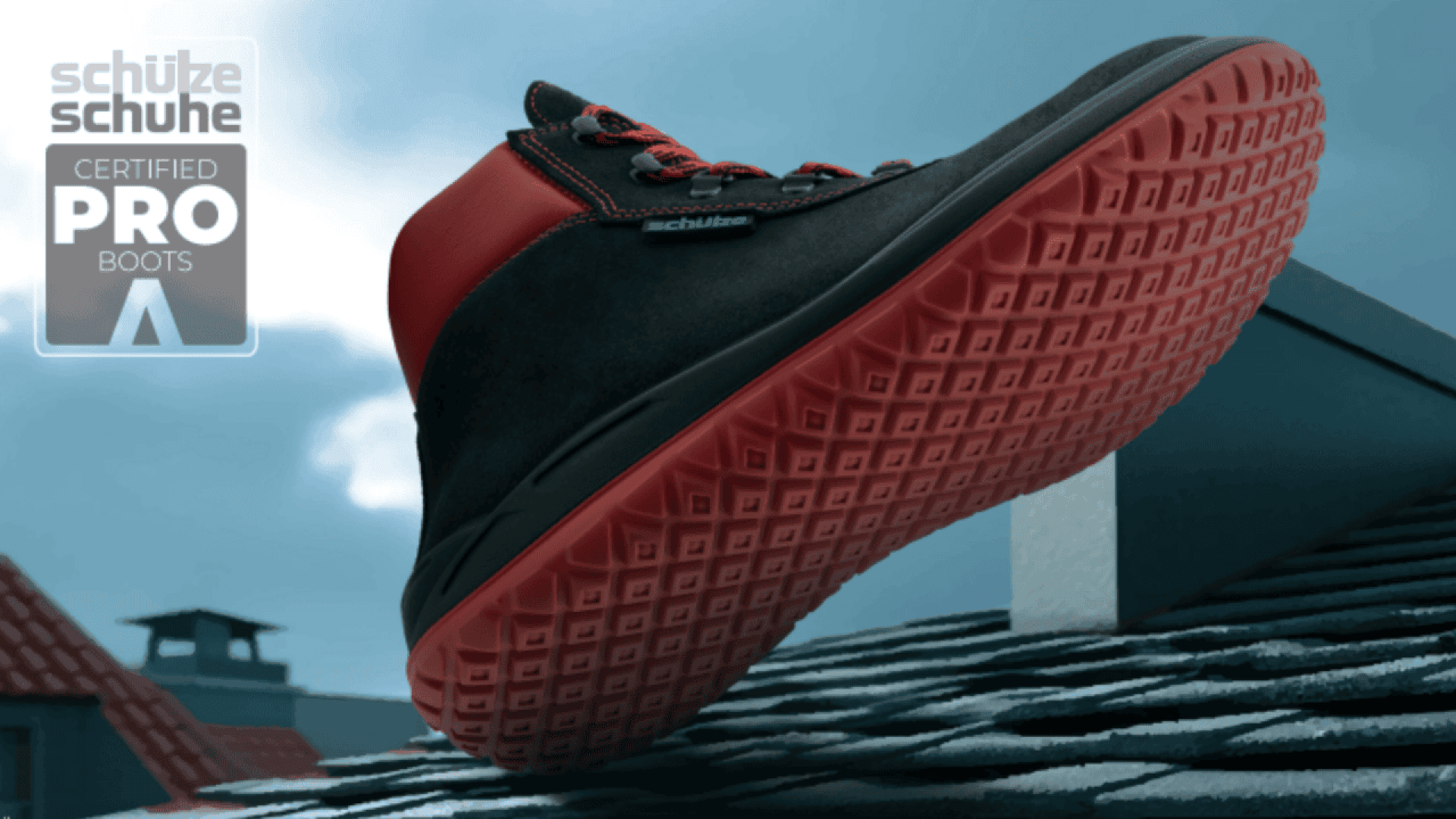 A black and red boot with a textured red sole steps on a rooftop. Next to it, a “schütze schuhe CERTIFIED PRO BOOTS” badge appears. The background shows rooftops and a cloudy sky.