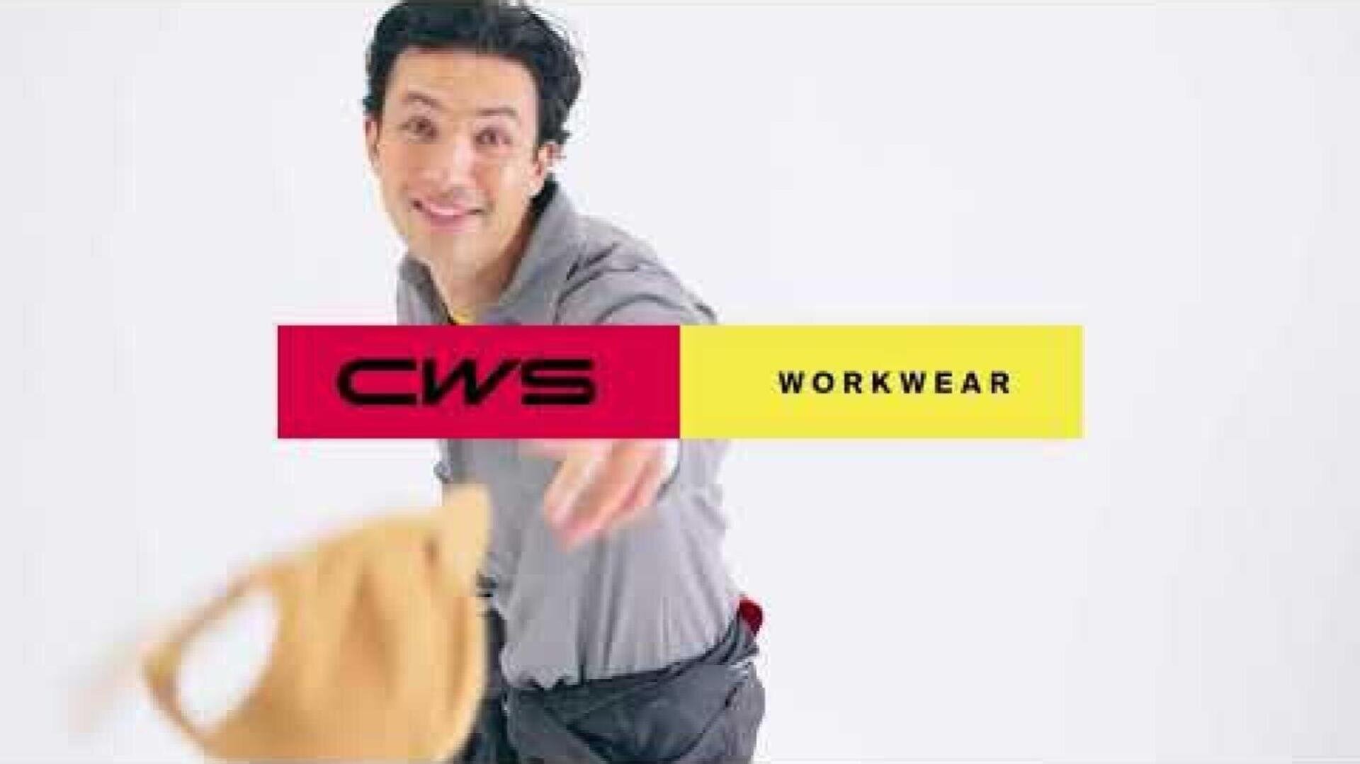 A smiling man in gray work clothes throws a light brown cap at the camera. The image is superimposed by a red and yellow banner with the inscription CWS WORKWEAR. The background is plain white.