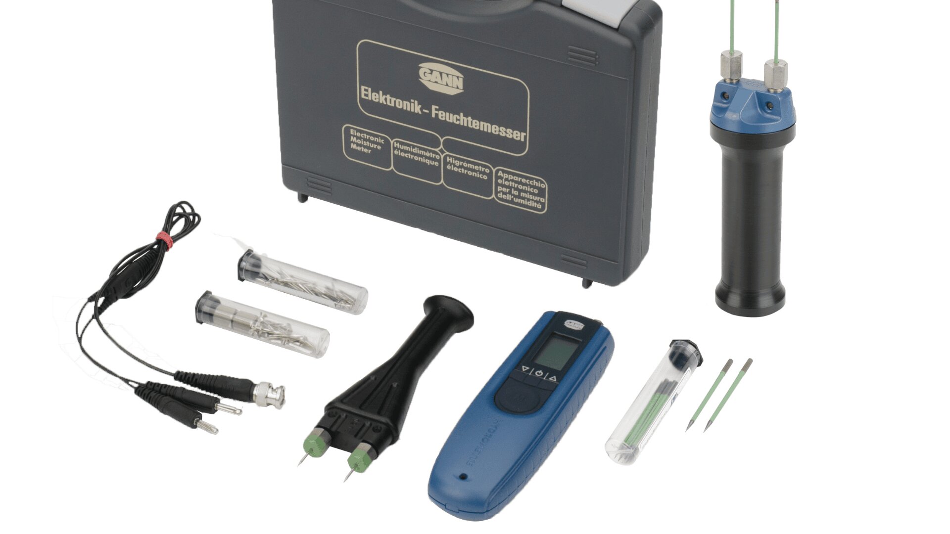 A set of electronic moisture measuring tools, including a digital meter, probes, test tubes, cables with plugs, and carrying case labeled Elektronik-Feuchtemesser, displayed on a white background.