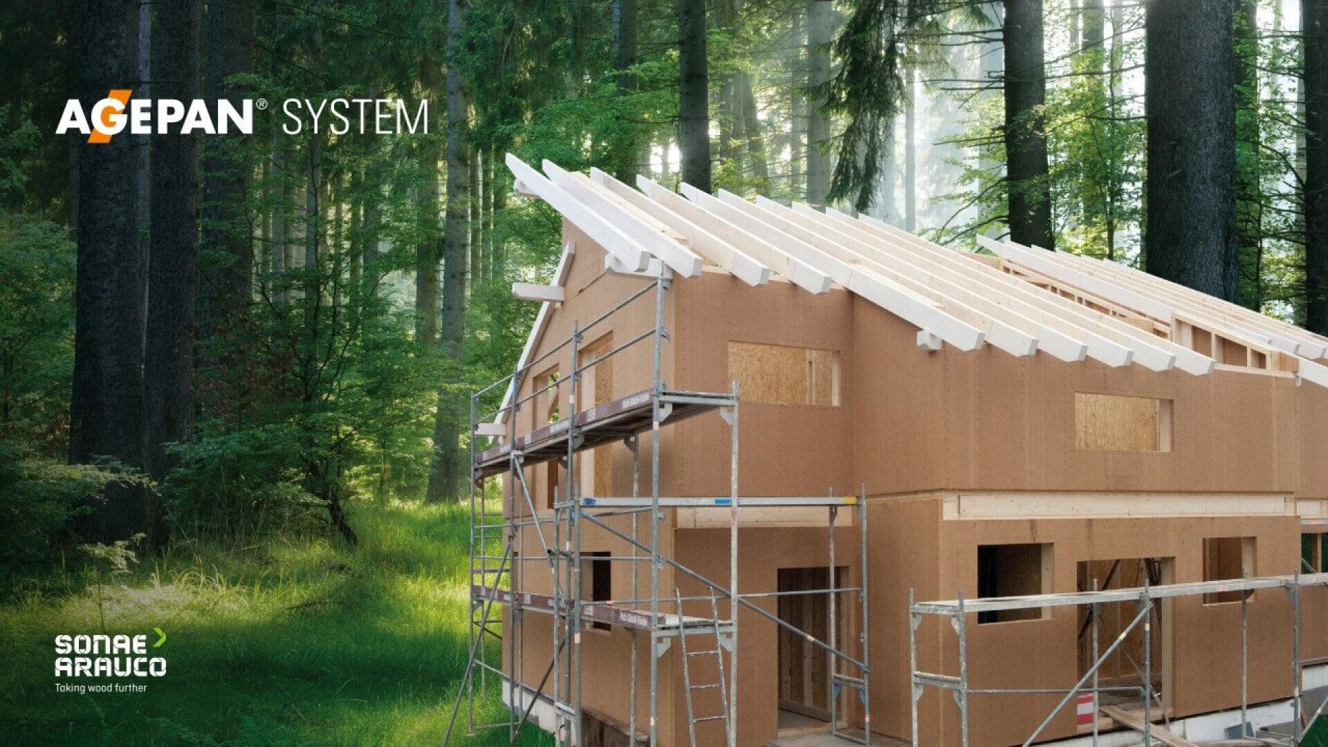 A partially constructed wooden house stands on scaffolding in a lush, green forest. Sunlight filters through tall trees. The words “AGEPAN SYSTEM” and “SONAE ARAUCO” are displayed on the image.
