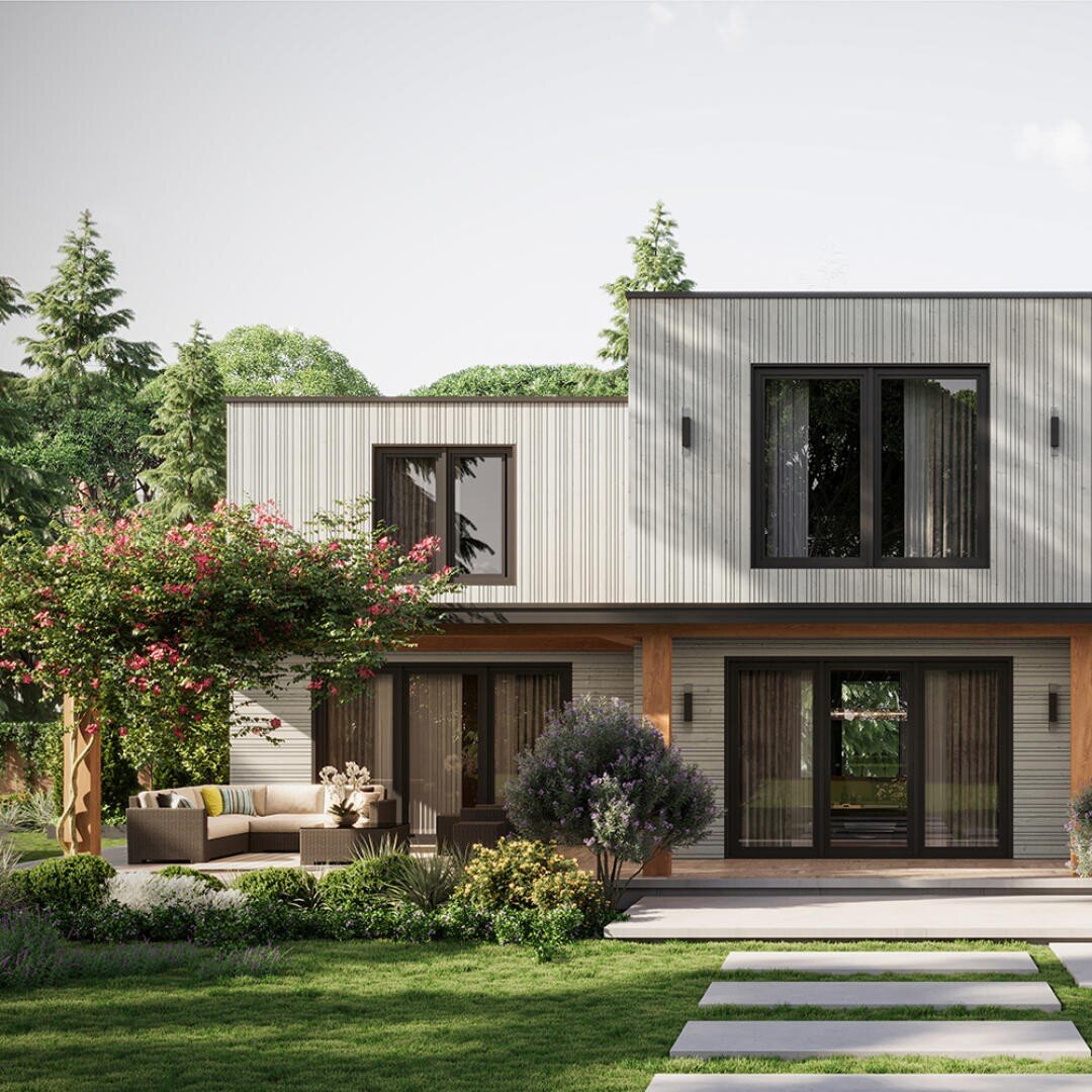 Modernes zweistöckiges Haus mit großen Fenstern, einem Sitzbereich auf der Terrasse und einer üppigen grünen Landschaft mit Bäumen, Sträuchern und einem gepflegten Rasen. Ein Steinpfad führt zum Eingang.