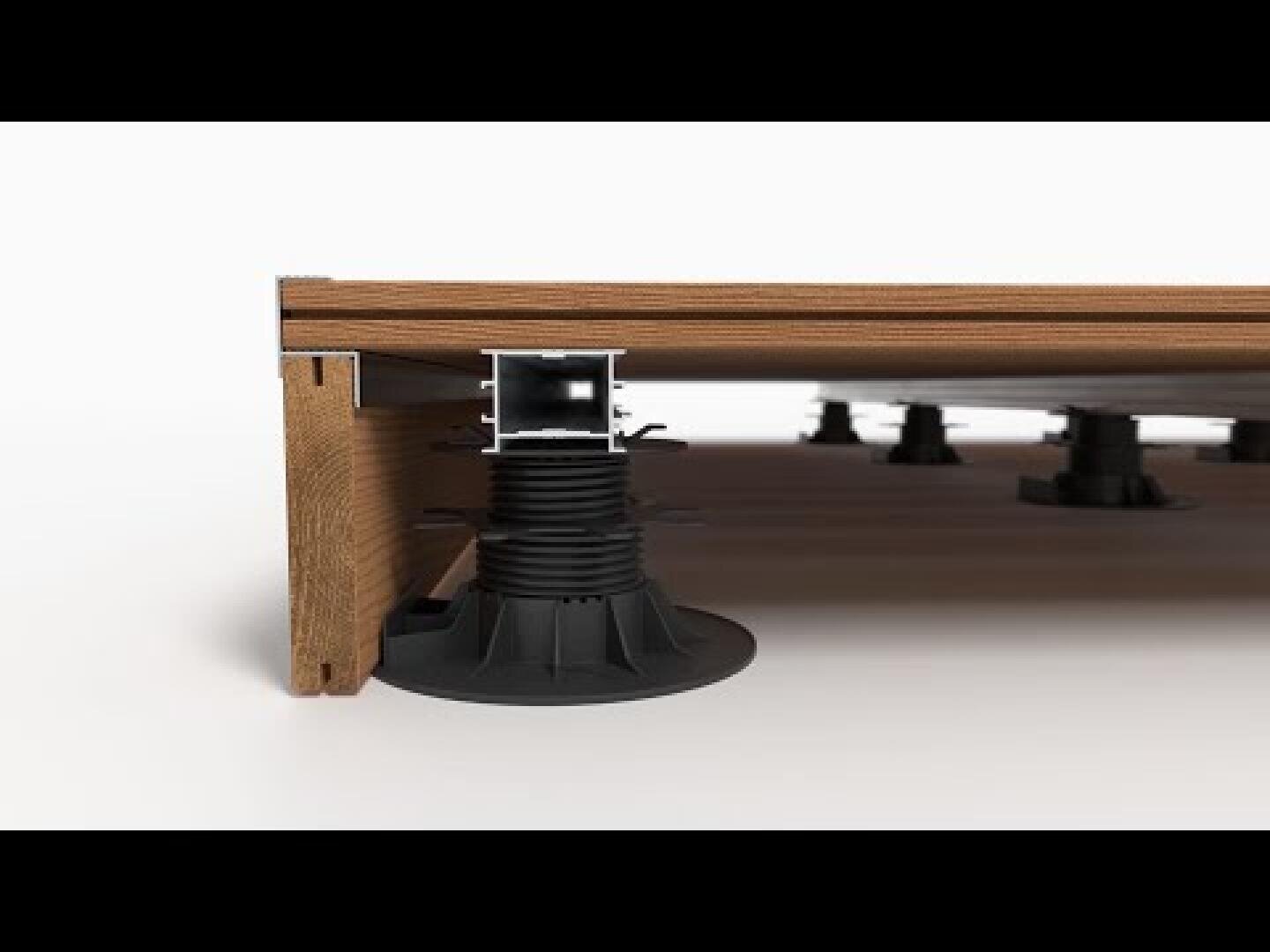 Side close-up of a raised wooden deck supported by adjustable black plastic plinths on a white background.