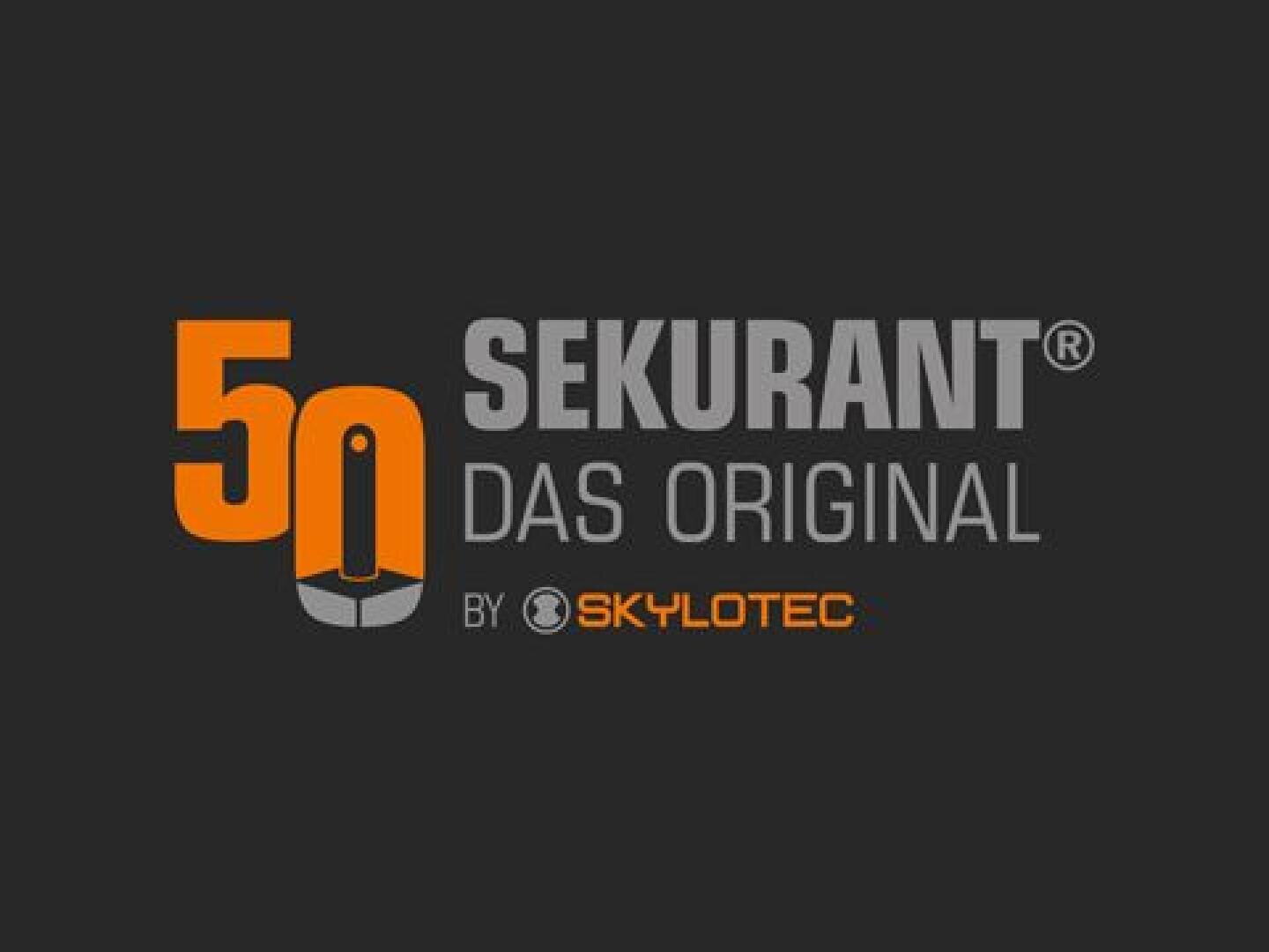 Logo with text: 50 SEKURANT DAS ORIGINAL BY SKYLOTEC in orange and gray on a dark background. The number 50 is stylized, with part of the "0" reminiscent of an anchor or a safety device.