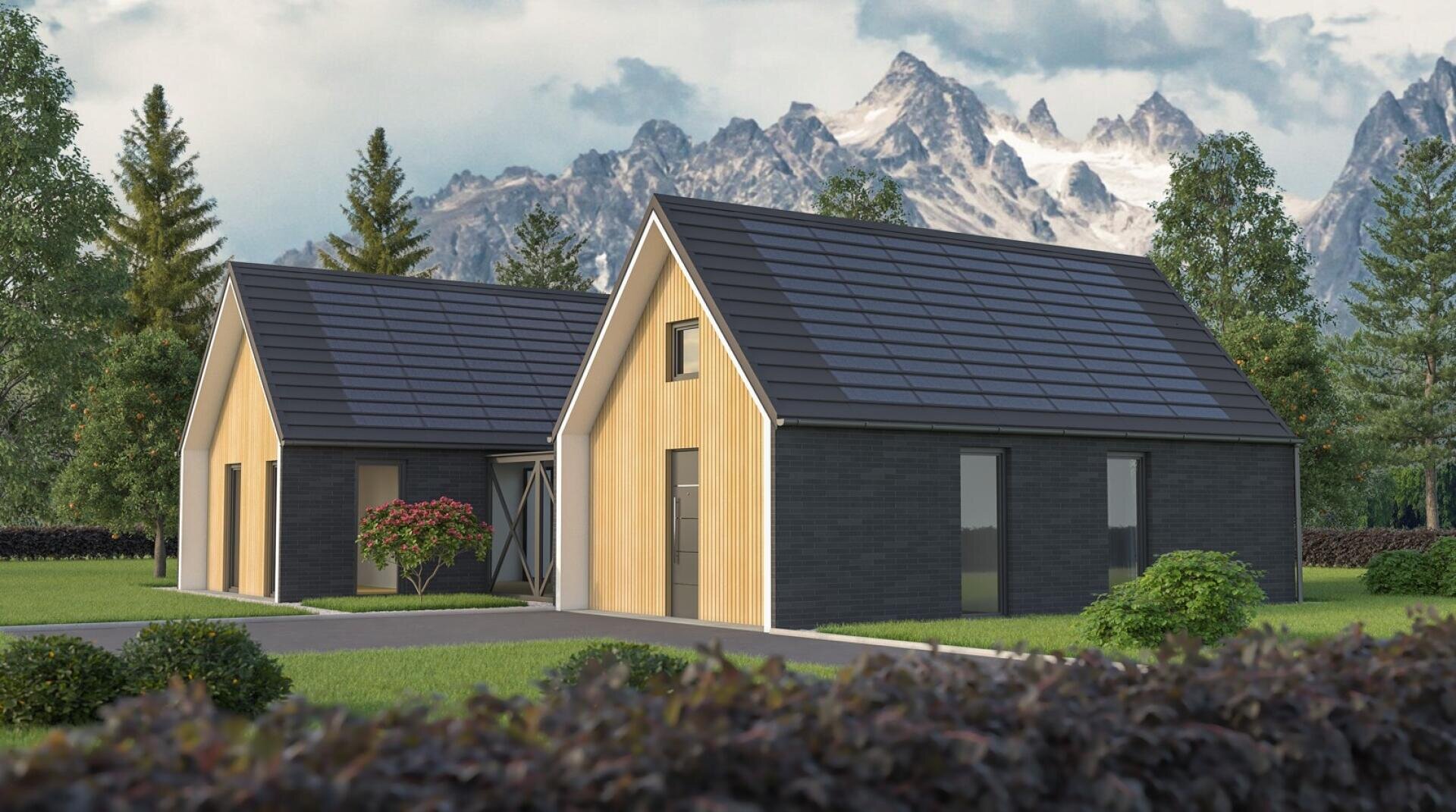 Ein modernes Haus mit zwei Giebeln, schwarzen Ziegelwänden und hellen Holzakzenten steht inmitten von grünen Bäumen und Gras, mit hohen Bergen im Hintergrund unter einem teilweise bewölkten Himmel.